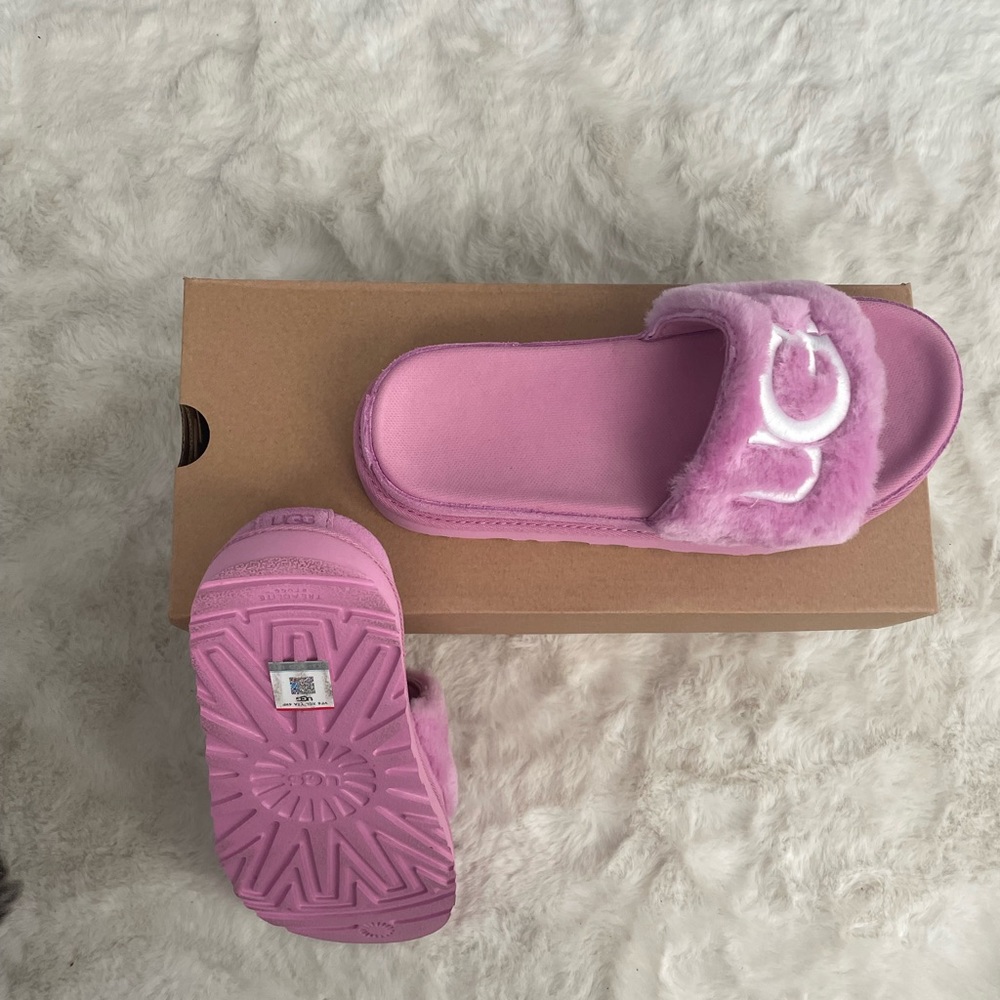 Pink UGG slides